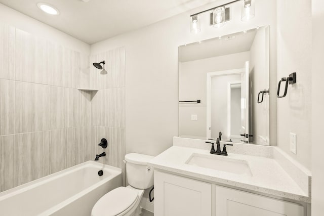 bathroom featuring shower / bath combination, toilet, and vanity