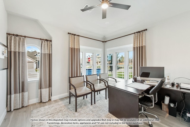 office with ceiling fan and light hardwood / wood-style flooring