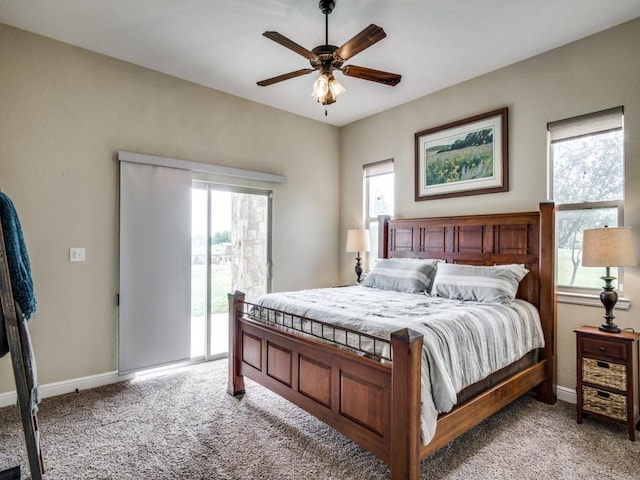 bedroom featuring ceiling fan, light colored carpet, and access to exterior