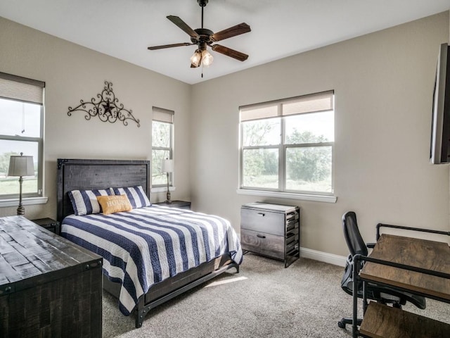 bedroom featuring ceiling fan and carpet floors