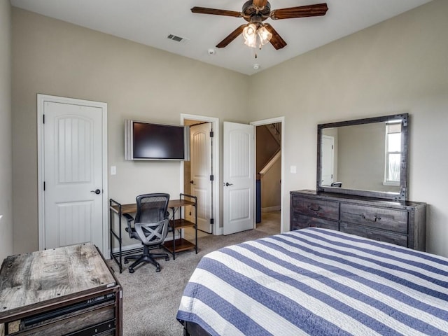 bedroom with light colored carpet and ceiling fan