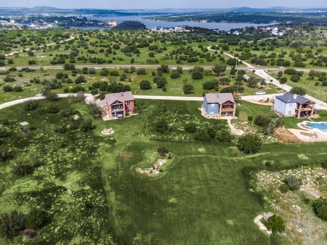 birds eye view of property with a water view and a rural view