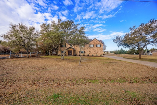 view of front of home with a front yard