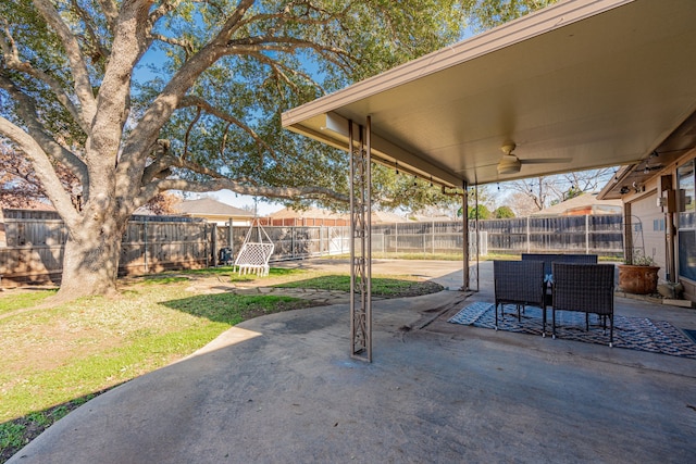 view of patio featuring ceiling fan