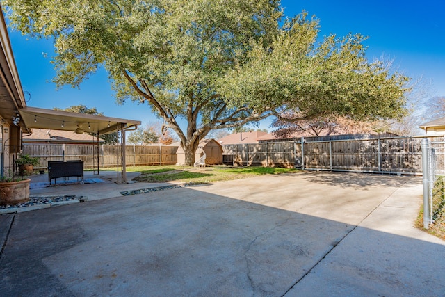 view of patio / terrace with a storage unit