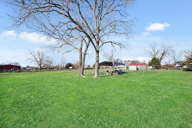 view of yard with a detached carport