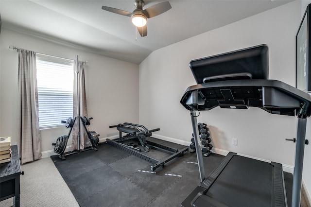 workout area featuring ceiling fan, a wealth of natural light, and lofted ceiling