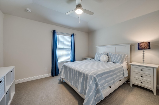 bedroom featuring ceiling fan, light carpet, and lofted ceiling