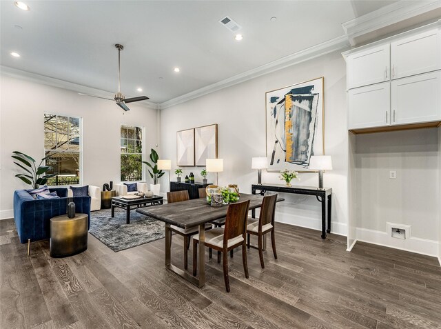 kitchen with white cabinetry, light stone countertops, sink, and hardwood / wood-style flooring