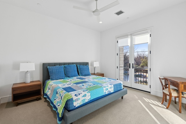 carpeted bedroom featuring access to exterior, french doors, and ceiling fan