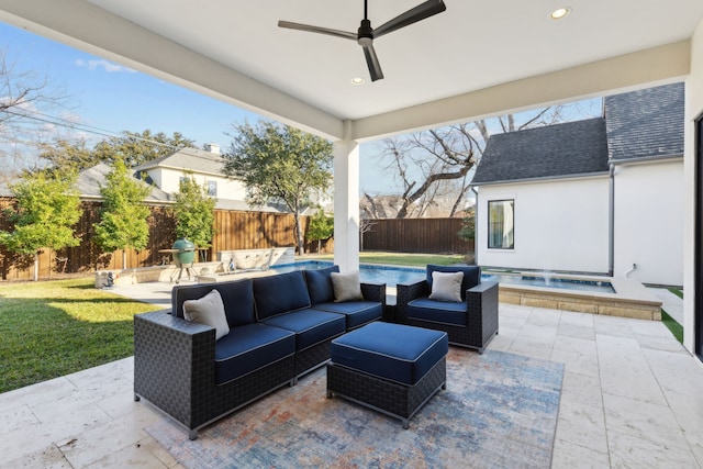 view of patio with ceiling fan, outdoor lounge area, and a hot tub