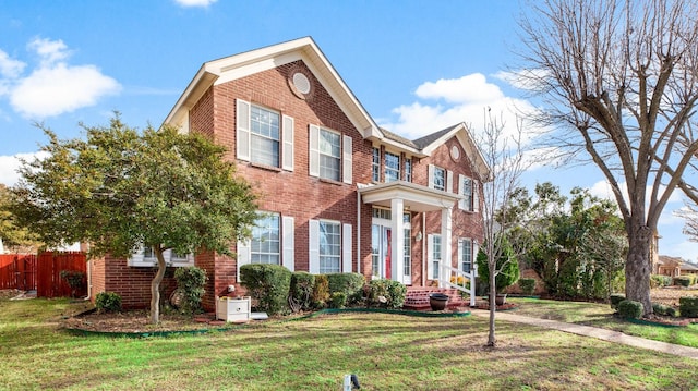 view of front of home featuring a front lawn