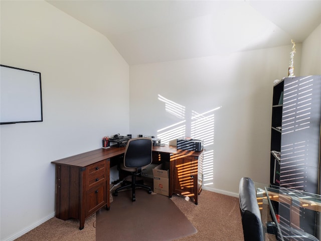 office area with lofted ceiling and light carpet