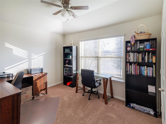 office space with light carpet, vaulted ceiling, plenty of natural light, and ceiling fan