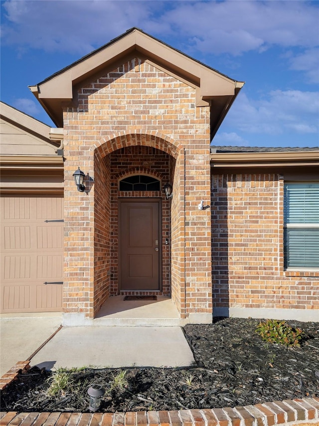 property entrance featuring a garage