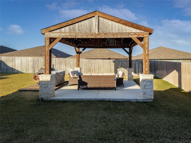 view of patio featuring a gazebo and an outdoor hangout area