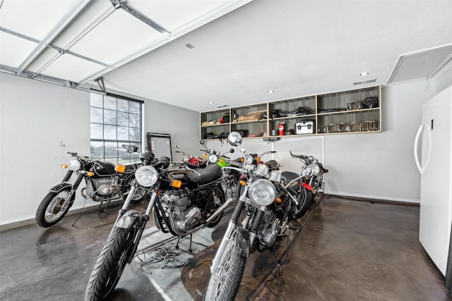 garage with white refrigerator