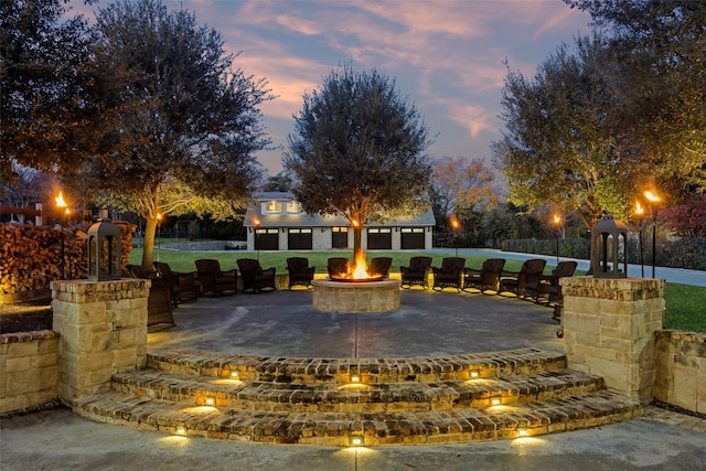 view of community featuring a fire pit