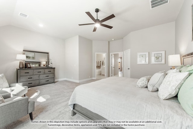 bedroom featuring light carpet, connected bathroom, ceiling fan, and lofted ceiling