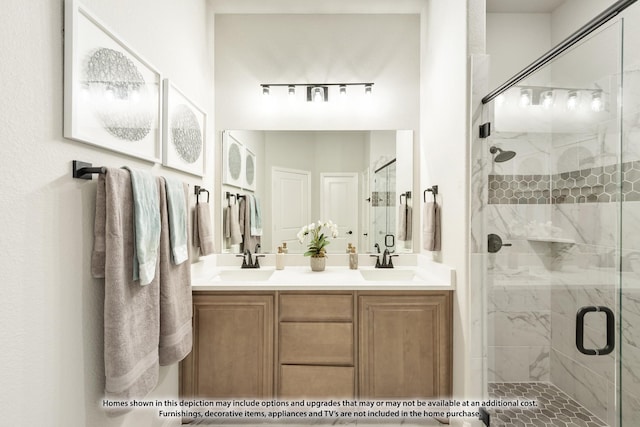 bathroom featuring vanity and an enclosed shower