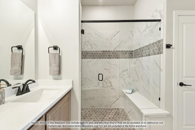 bathroom with vanity and an enclosed shower