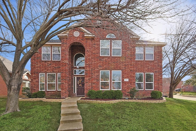 view of front of home with a front yard