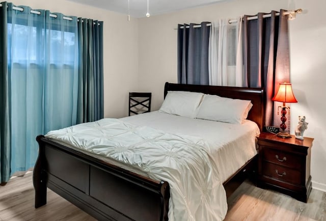 bedroom featuring light hardwood / wood-style floors