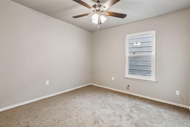 empty room with carpet flooring and ceiling fan