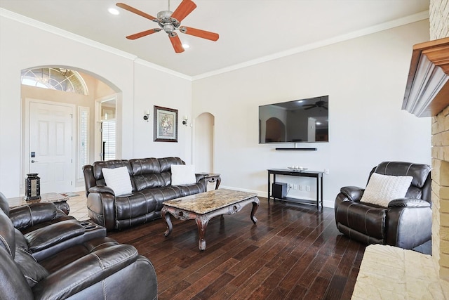 living room with ceiling fan, ornamental molding, and hardwood / wood-style floors