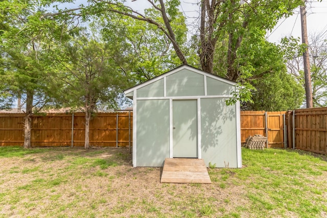 view of outbuilding with a lawn