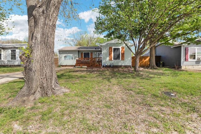 ranch-style home with a front yard