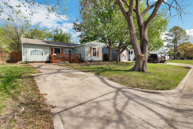 single story home with a front yard