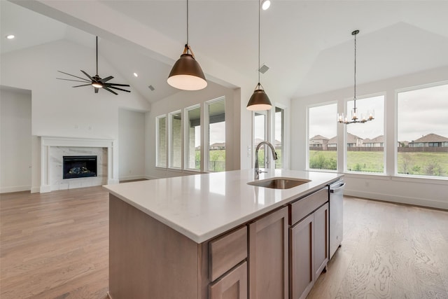 1058 Bingham Way, Forney, TX 75126 - kitchen featuring a sink, plenty of natural light, dishwasher, recessed lighting, and light wood-style floors