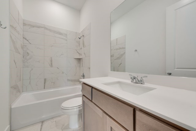 full bathroom featuring vanity, tiled shower / bath combo, and toilet