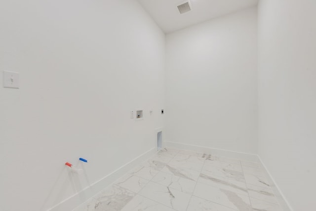 laundry area featuring hookup for a washing machine, gas dryer hookup, and electric dryer hookup