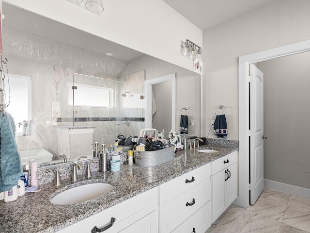 bathroom featuring a shower with door, vaulted ceiling, and vanity