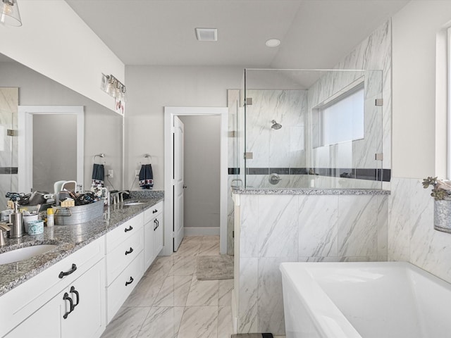 bathroom with vanity, independent shower and bath, and tile walls