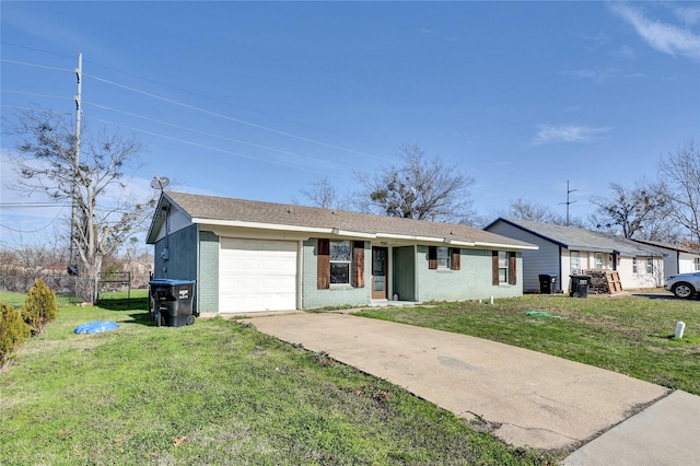 ranch-style home with a front yard and a garage