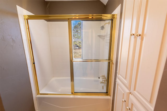 bathroom featuring enclosed tub / shower combo