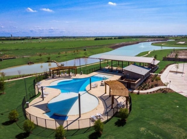 view of pool featuring a water view