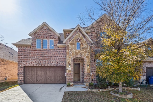 view of front of property with a garage