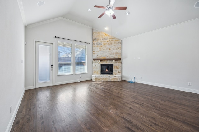 unfurnished living room featuring dark wood-type flooring, high vaulted ceiling, ornamental molding, ceiling fan, and a fireplace