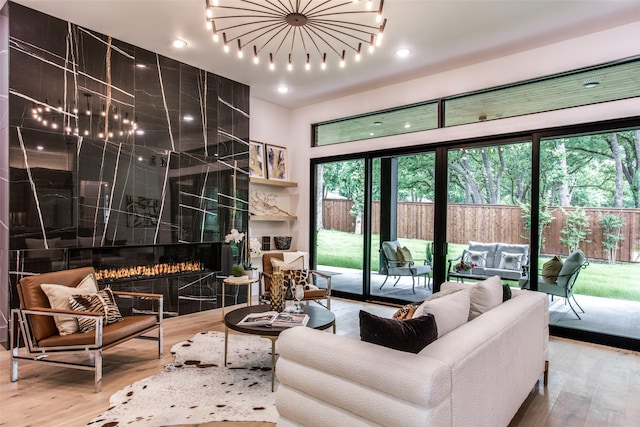 living room featuring a fireplace and wood finished floors