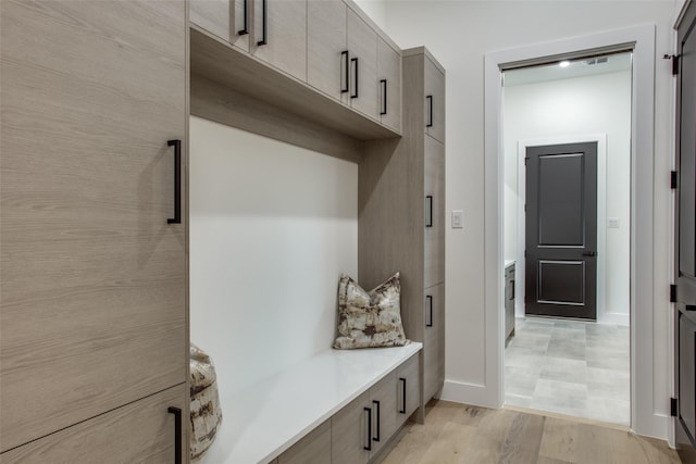 mudroom featuring light wood-style floors