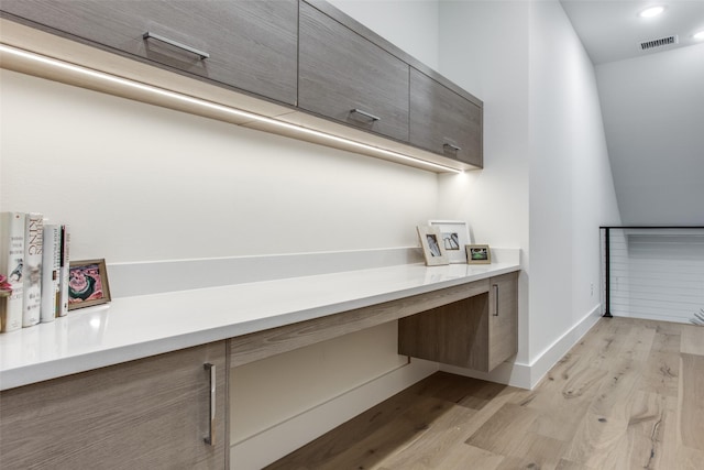 interior space with visible vents, recessed lighting, light wood-type flooring, and baseboards