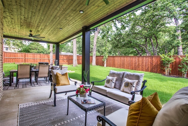 view of patio with outdoor dining space, ceiling fan, an outdoor hangout area, and a fenced backyard