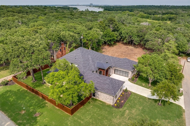 bird's eye view featuring a forest view