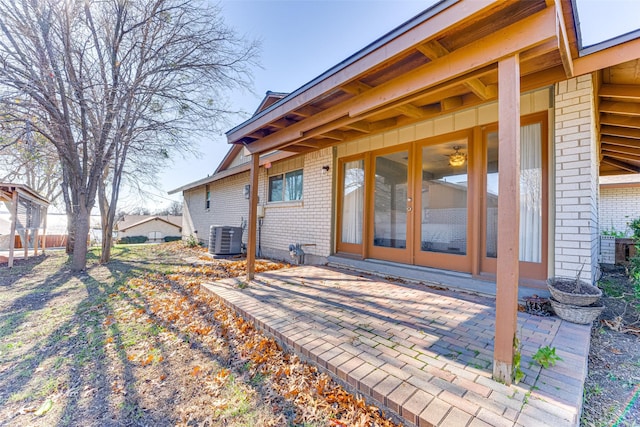 exterior space featuring central AC and a patio area