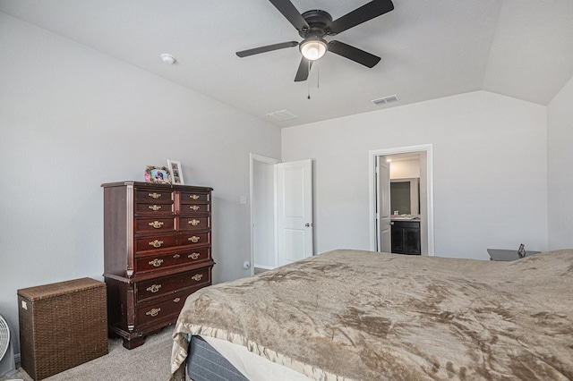 bedroom featuring connected bathroom, ceiling fan, light carpet, and vaulted ceiling