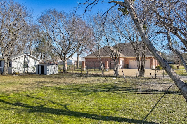 view of yard with a storage unit